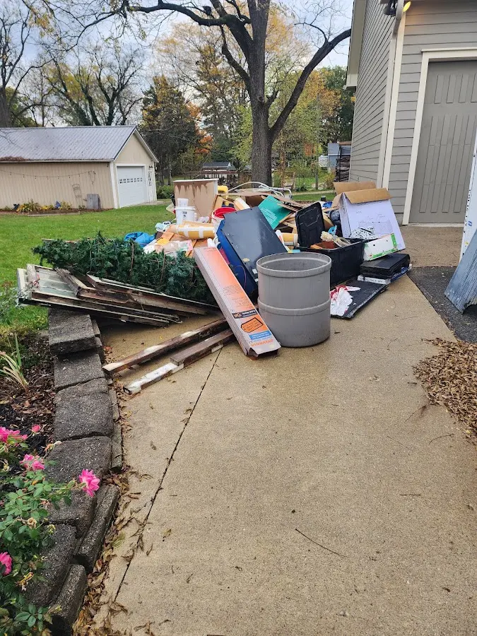 Dumpster being loaded with debris for 3 Yard Dumpster Rental in Soquel